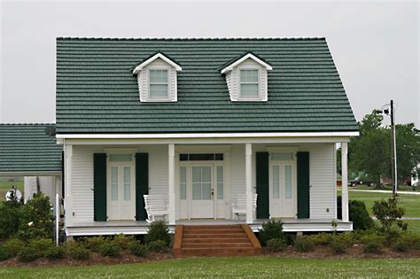 one story house with green metal roof design|green one story house.